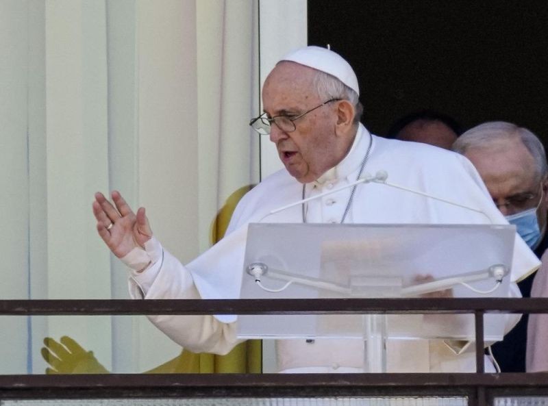 Pope Francis appears on a balcony of the Agostino Gemelli Polyclinic in Rome on July 11, where he is recovering from intestinal surgery, for the traditional Sunday blessing and Angelus prayer. (AP Photo)